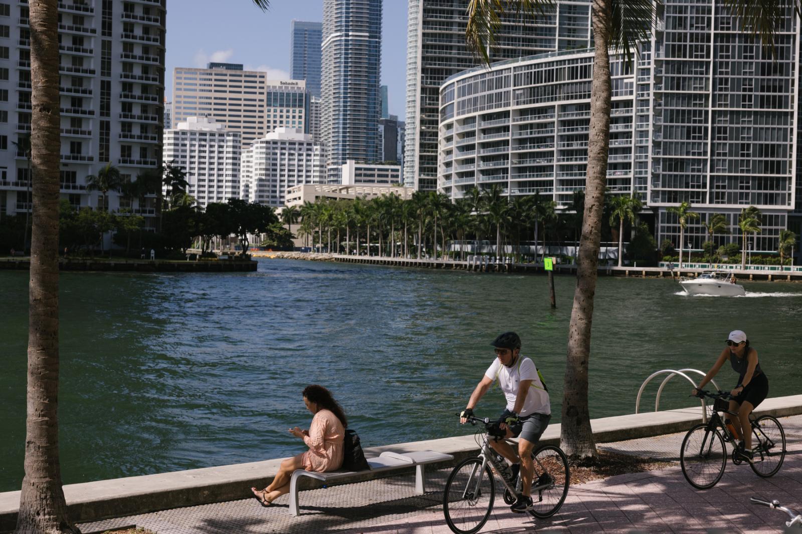 Visitors bike on the Miami Rive...ami, Florida on July 24, 2022. 