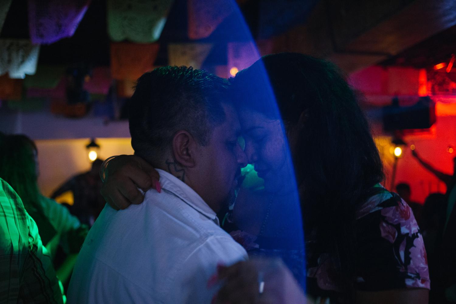 A couple dances at Taberna del Pacifico, a dancehall featuring live banda music, in Mexico City, Mexico. 