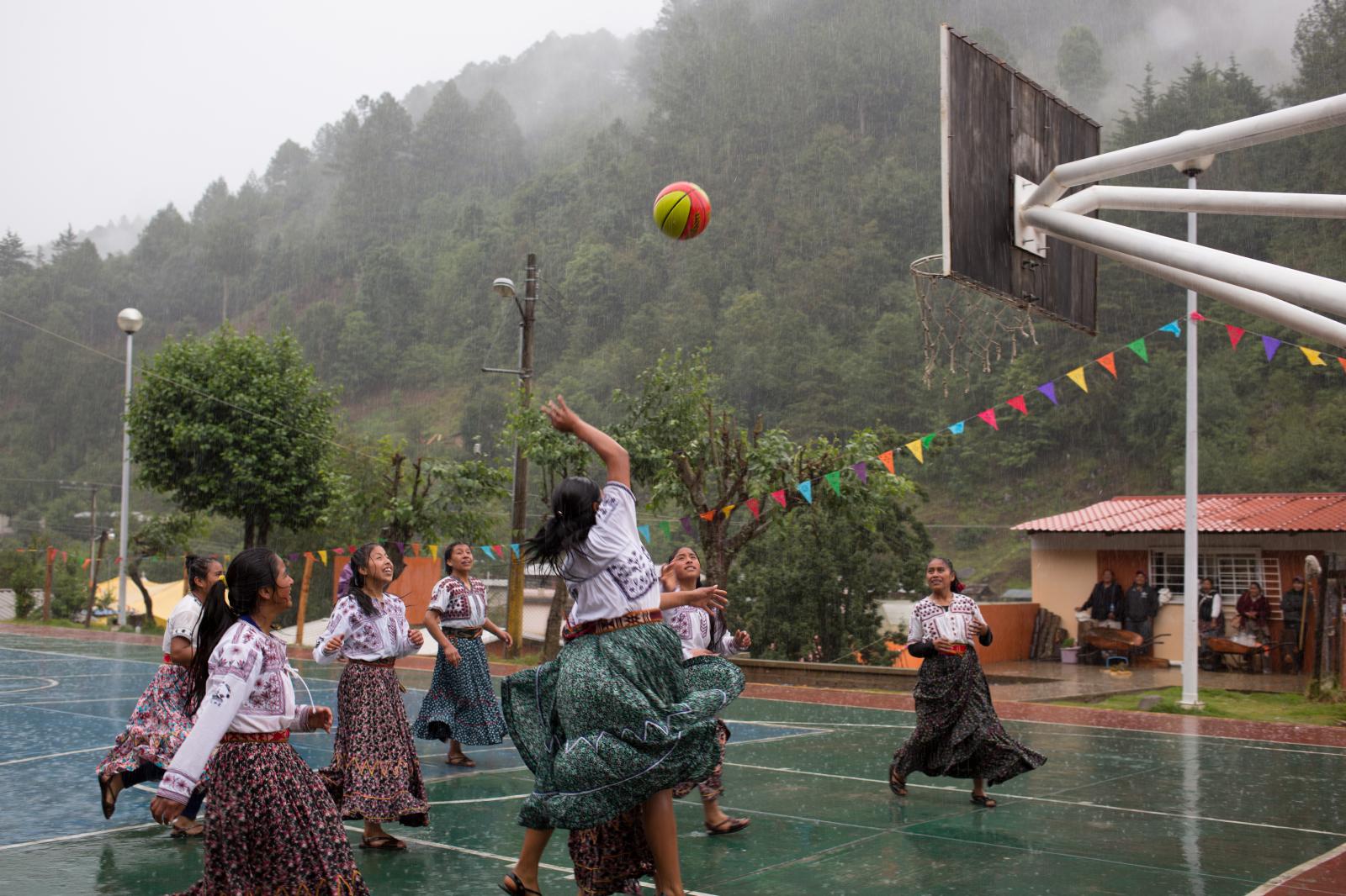 Team Gubby plays against Las Combinadas de Tlahui during a patron saint festival in Santa Maria Tlahuitoltepec, Oaxaca, Mexico on June 10, 2018. 