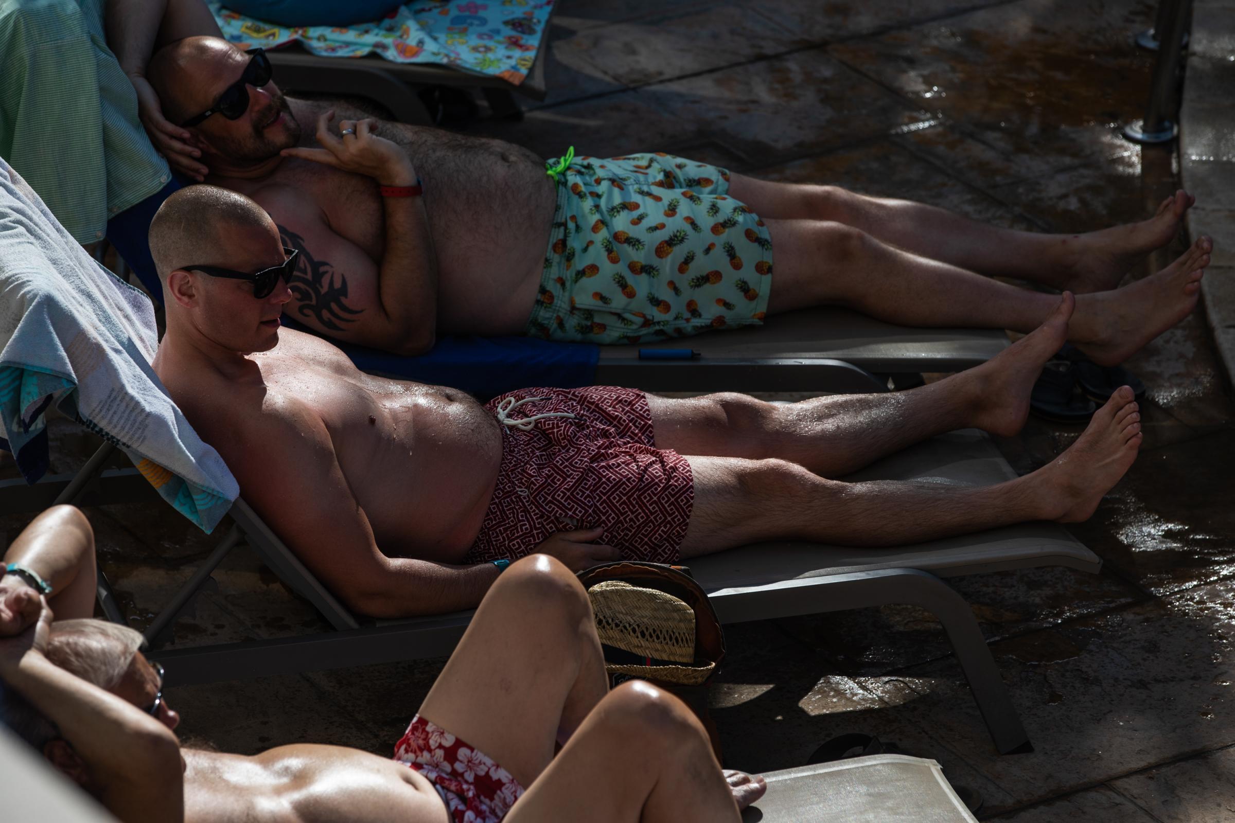 Heatwave Sweeps Across Spain - BENIDORM, SPAIN - JULY 16: Tourists sunbathing at the...