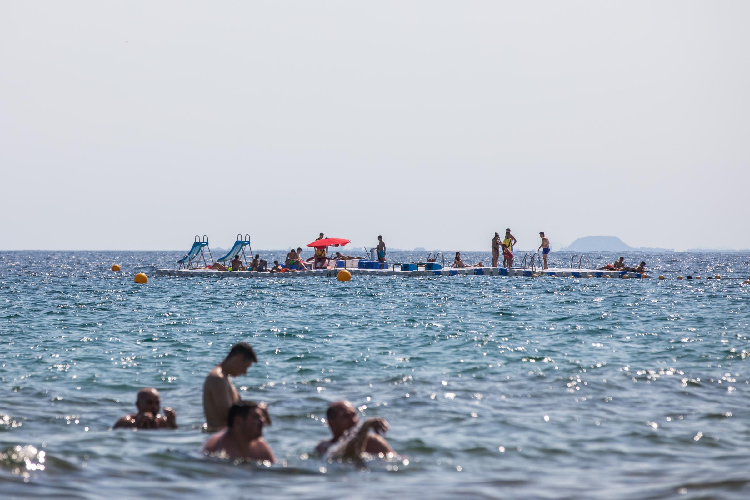 Heatwave Sweeps Across Spain - BENIDORM, SPAIN - JULY 16: Tourists enjoy a platform for...