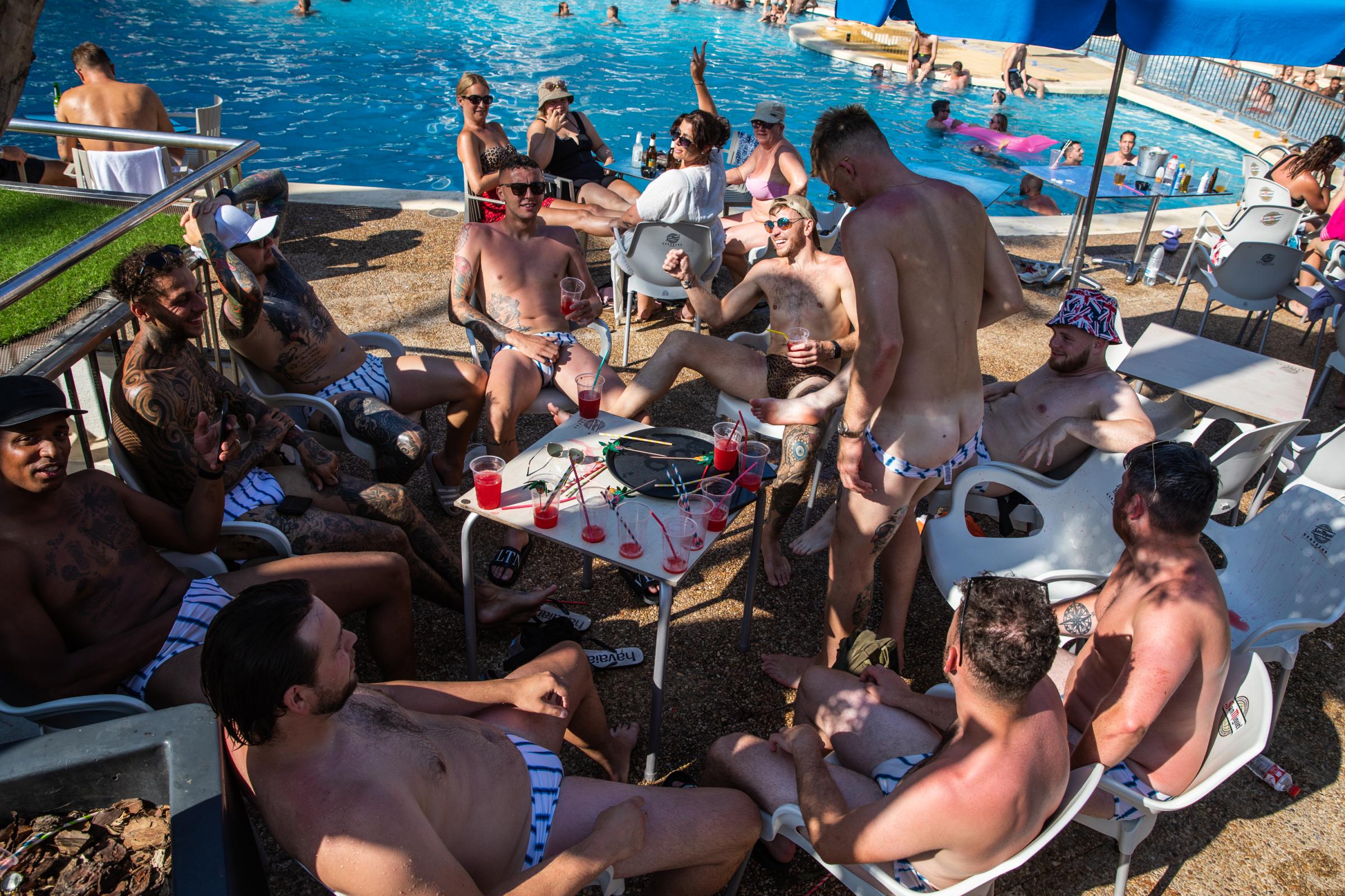 Heatwave Sweeps Across Spain - BENIDORM, SPAIN - JULY 16: English tourists drink in a...