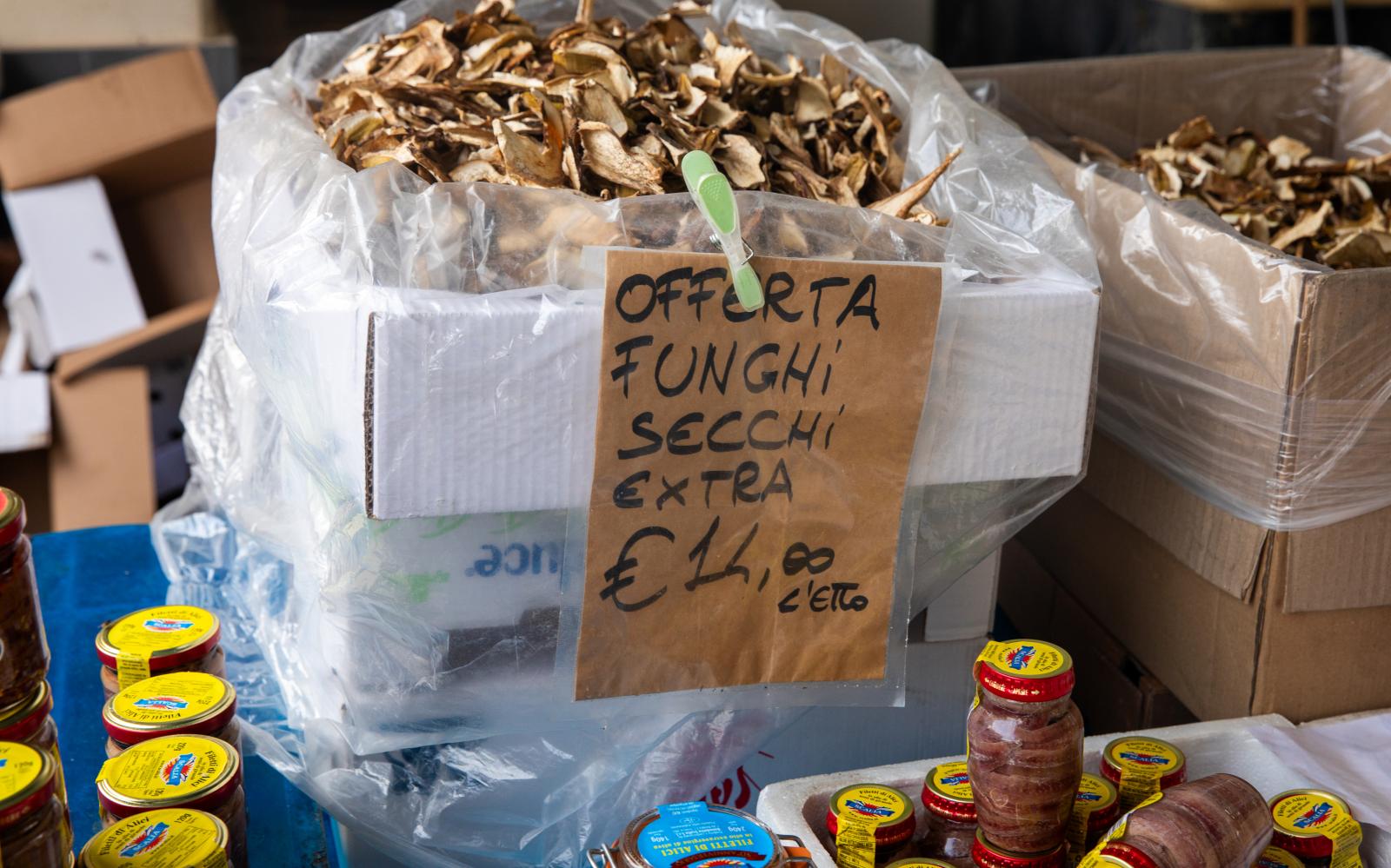 Mushrooms and Anchovies for Sale in Italy Food Market | Buy this image