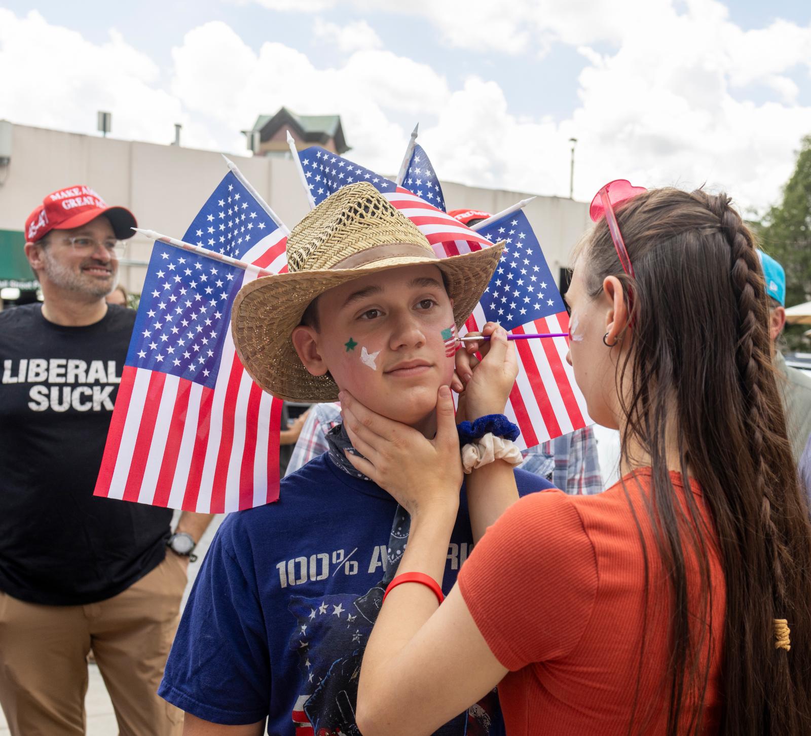 Face Painting and Liberal Suck Shirt