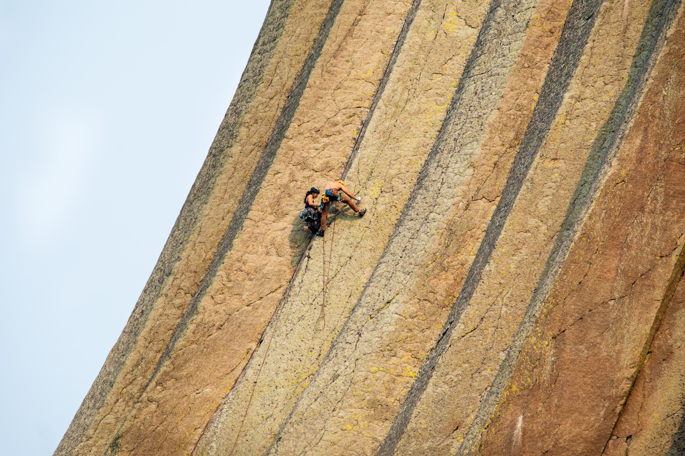 America - Climbers on Devil's Tower National Monument...