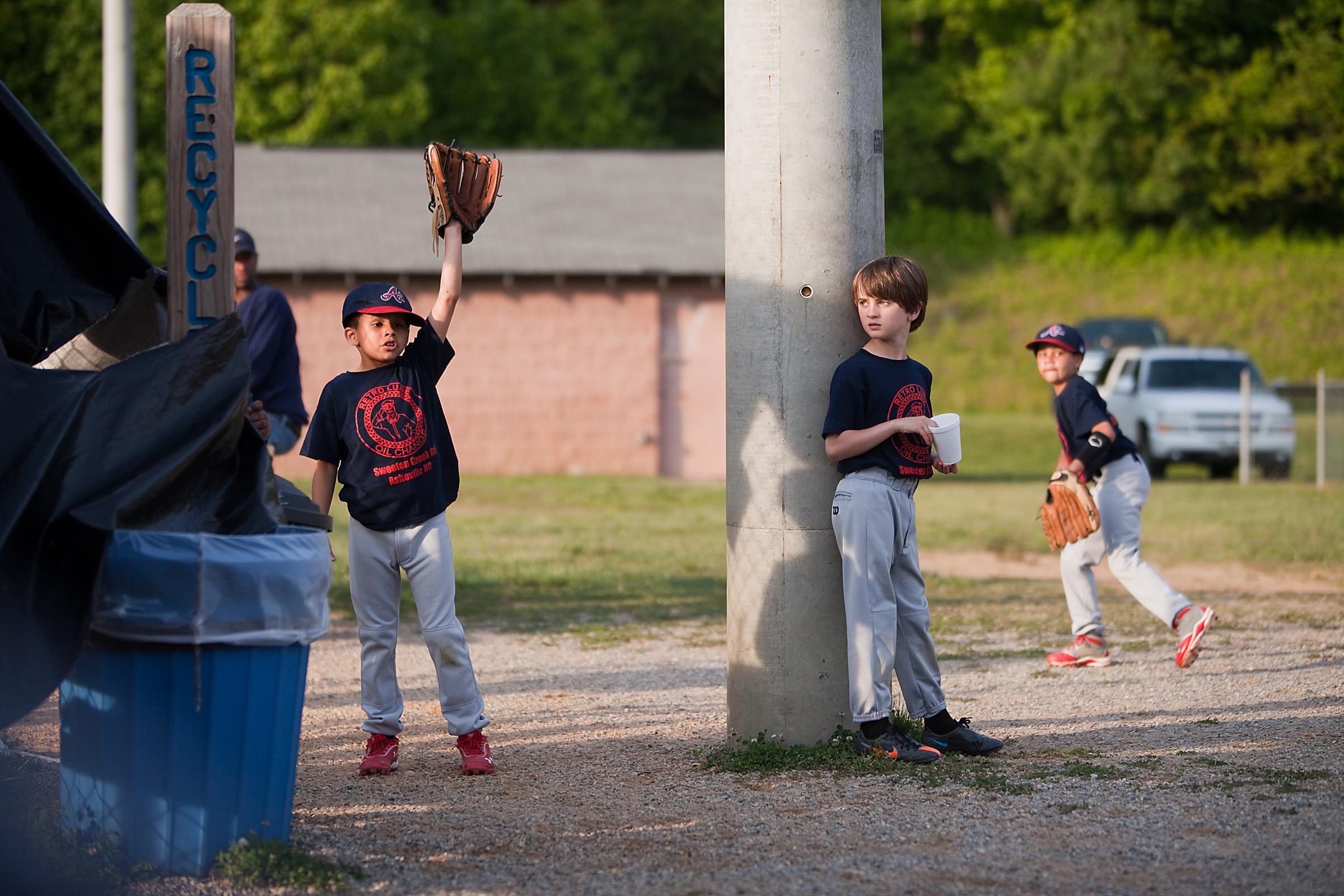 Growing Up - Baseball players practice and hang out between games.
