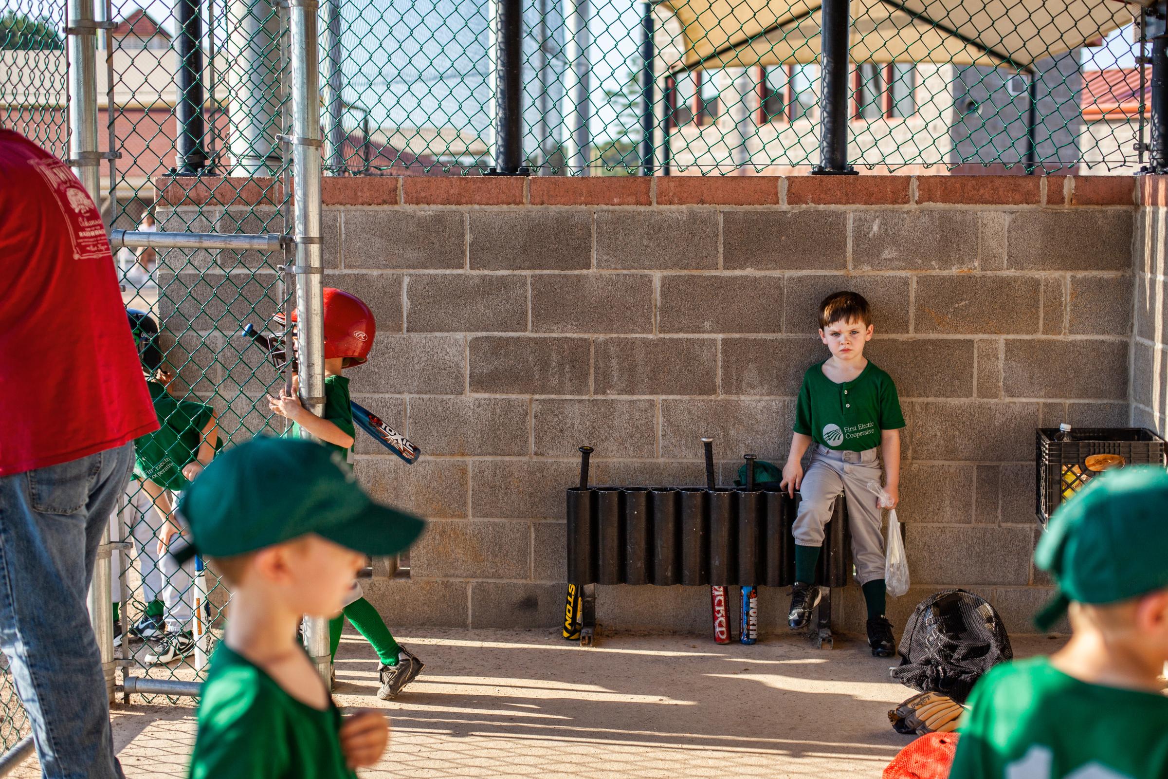 Growing Up - "There's no crying in baseball." A young...