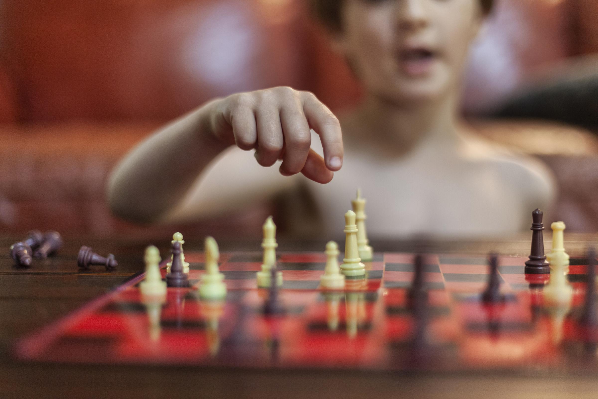 Growing Up - The benefits of teaching chess to youth include...