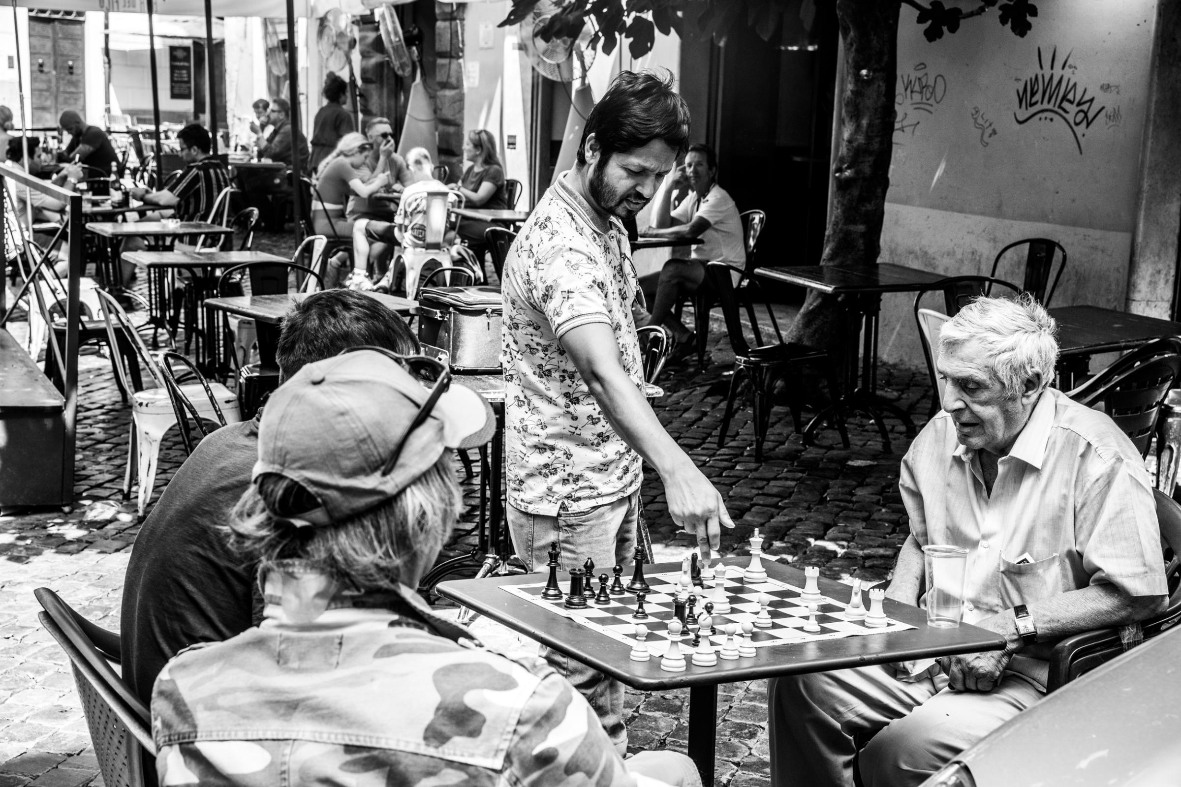 That Bad Boy Rome - A First-timer's Perspective - A chess match is underway along a side street in the historic center or Centro Storico of Rome.