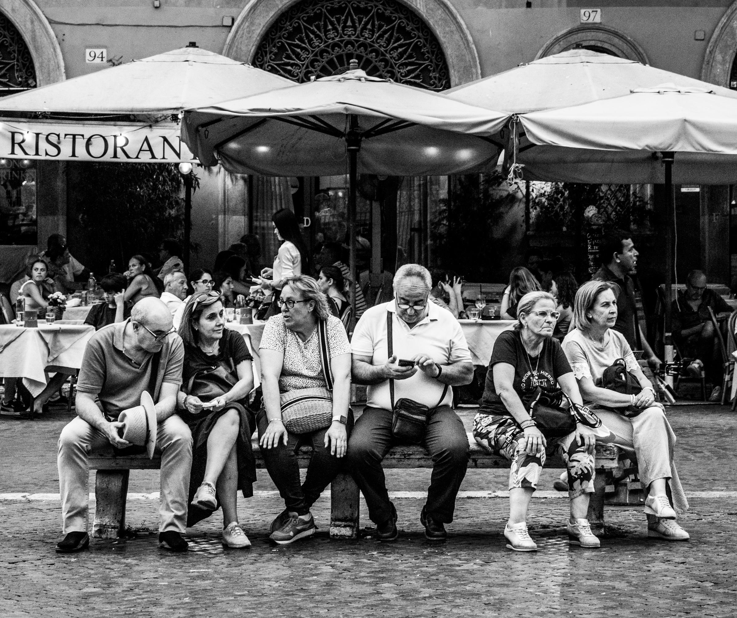 That Bad Boy Rome - A First-timer's Perspective - Tourists fill the benches along the Piazza Navona.