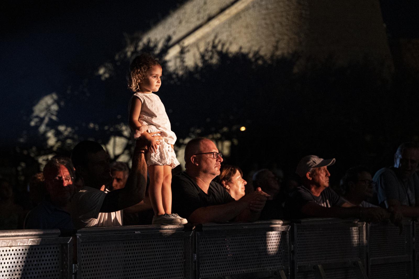 Image from Daily News - A little girl is watching Los Rebeldes' concert...
