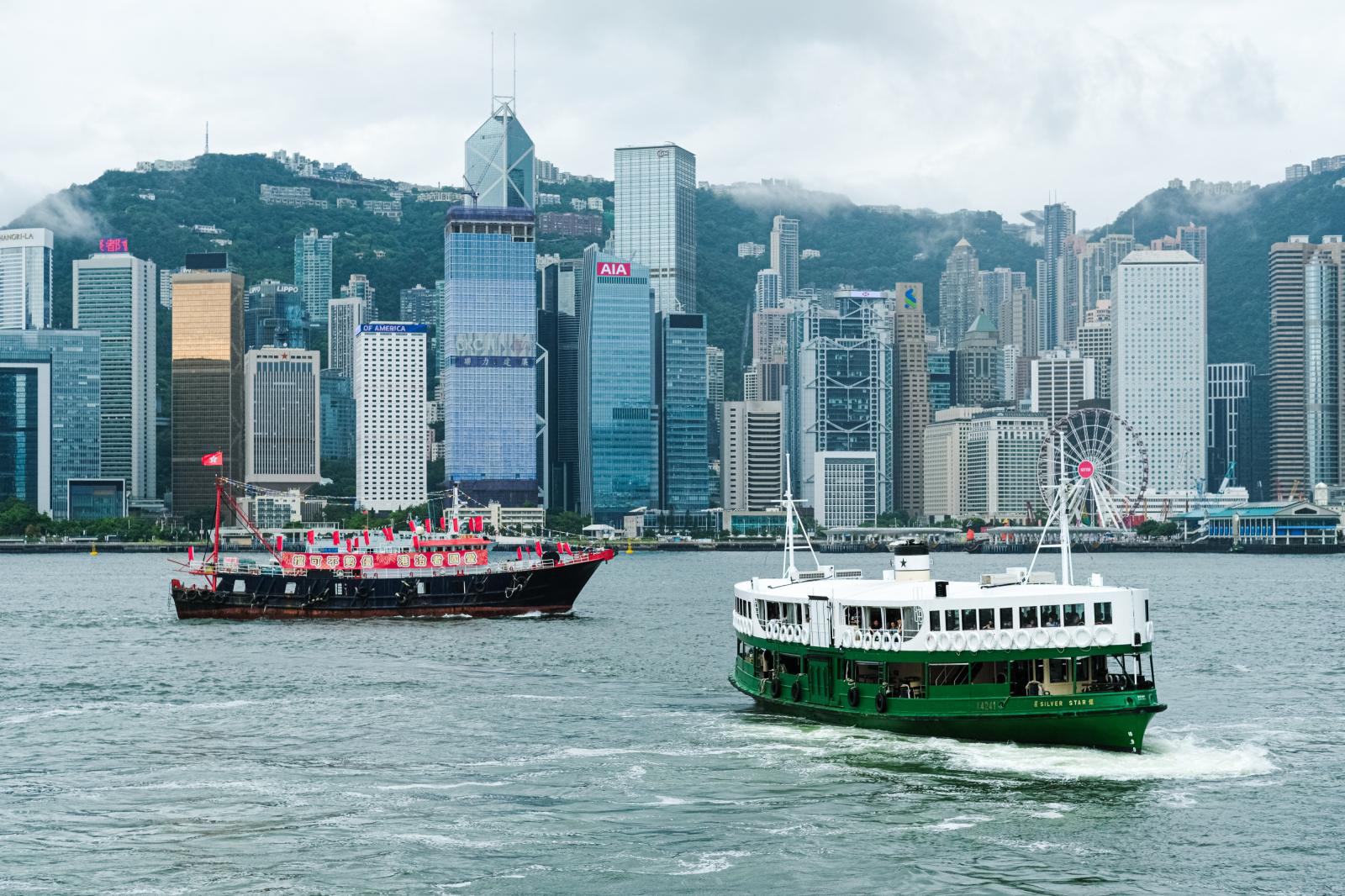 A star ferry and a fishing boat...rom Britain to China on July 1.