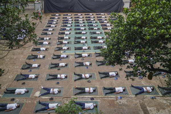 Bangladesh police attend a yoga session | Buy this image