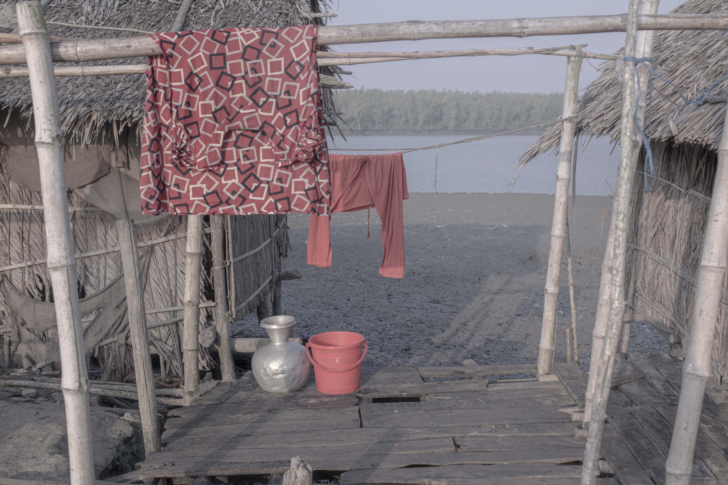 Salt Water's Roar -  A general view of a village next to the Sundarbans...