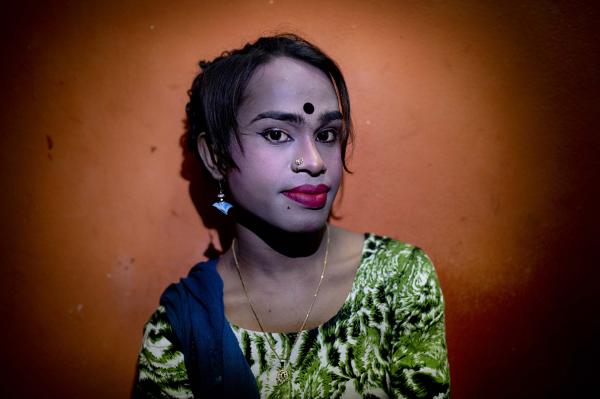 Image from Neither Man nor Woman - Munni, a transgender woman, poses for a photographer; she...