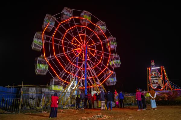 Image from Traditional Circus of Bangladesh -   Villagers enjoying a Ferris wheel ride on a village...