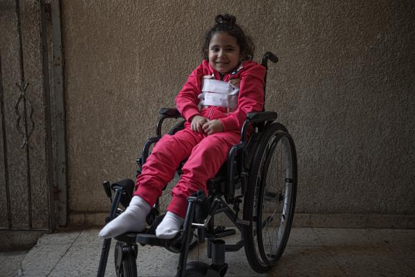 Gaza's Injured Struggle To Recover Six Months After Ceasefire - GAZA CITY, GAZA - NOVEMBER 30: Sarah Al-Matrabiee, 4, poses for a photo in her house in the...