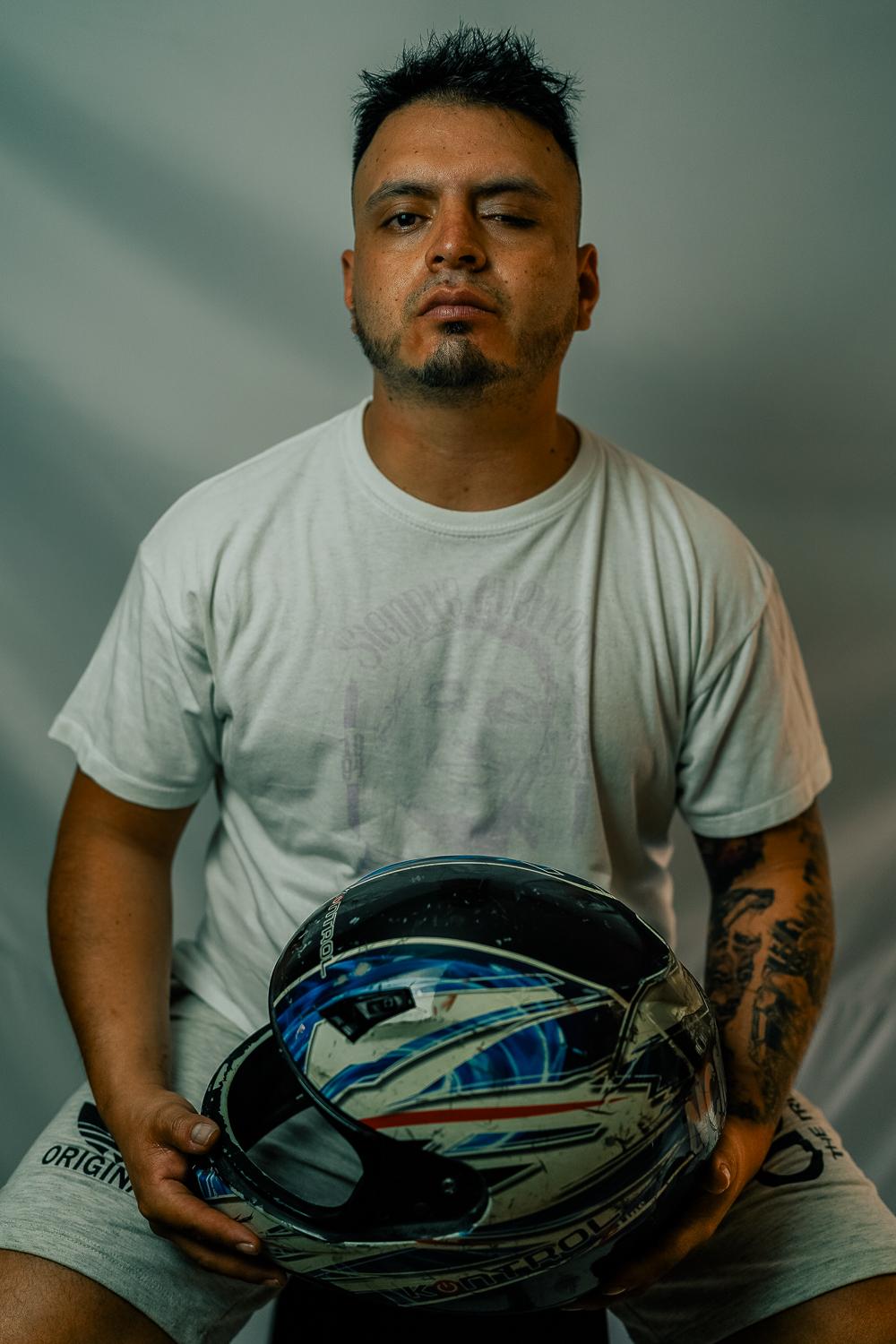 The Washington Post: Resistencia  - Michael is a frontline protester who poses with the helmet he used in the strike, and states,...