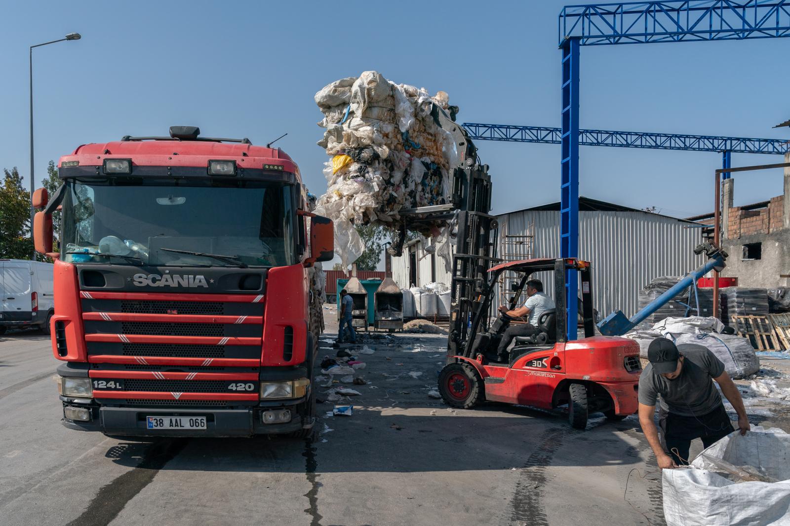 A semi-truck full of European w...sable plastic in Adana, Turkey.