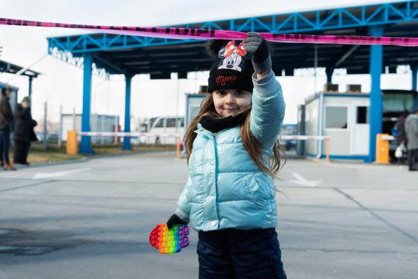 Ukrainian girl at the border station of Isaccea, Romania after crossing the border with Ukraine., February 27, 2022. | Buy this image