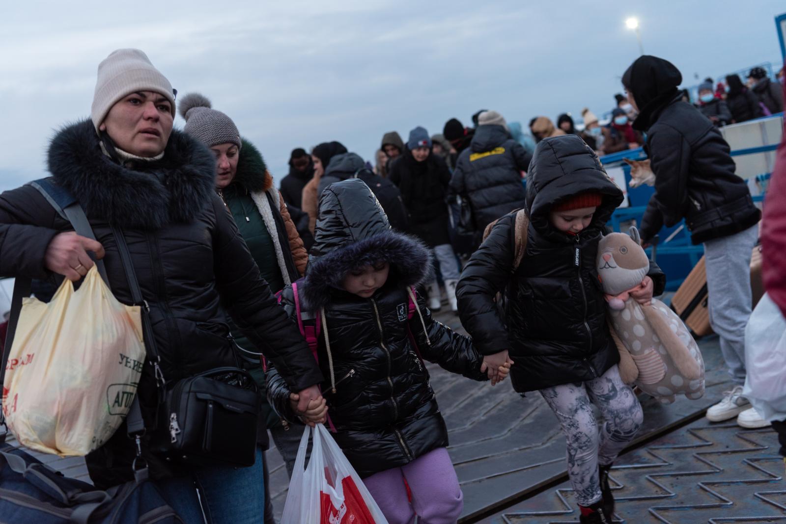 Ukrainian refugees arriving at the border station of Isaccea, Romania, February 27, 2022. | Buy this image