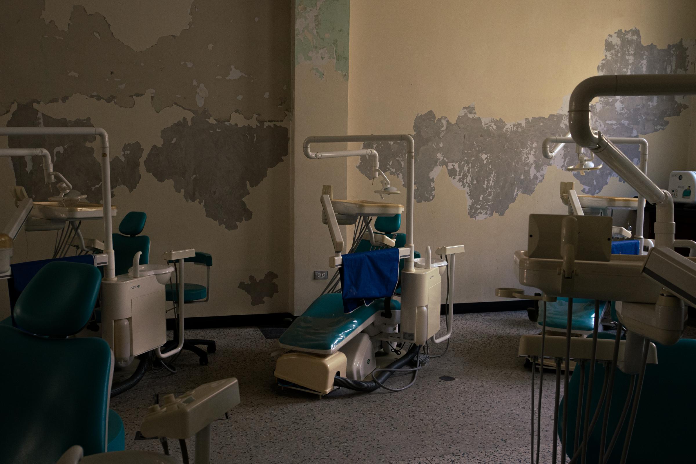 Aging and Abandoned in Venezuela's Failing State | The New Yorker - Walls peal in the dental school's classrooms at the...