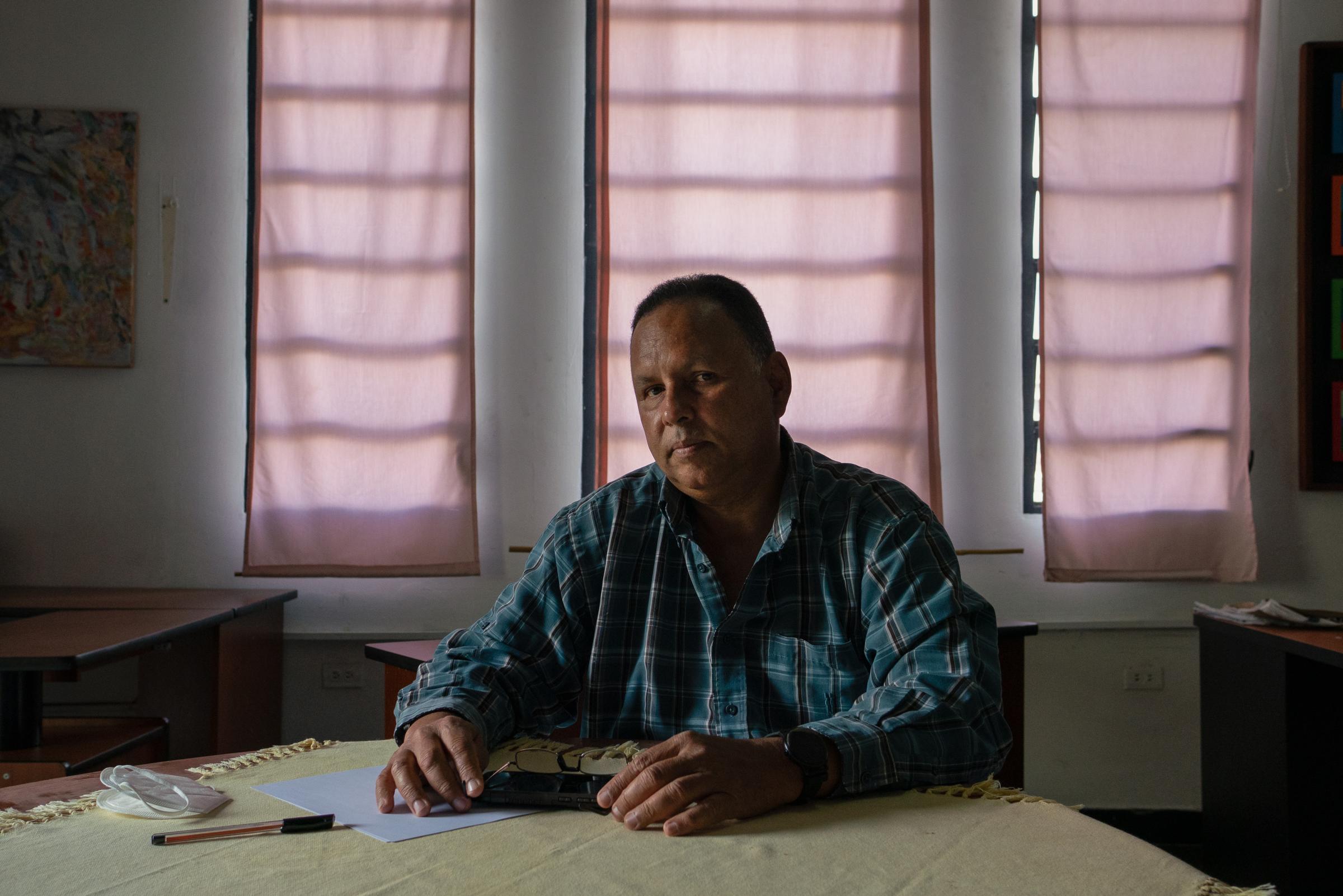 Aging and Abandoned in Venezuela's Failing State | The New Yorker - Professor Juan Carlos Rivero poses for a portrait in his...