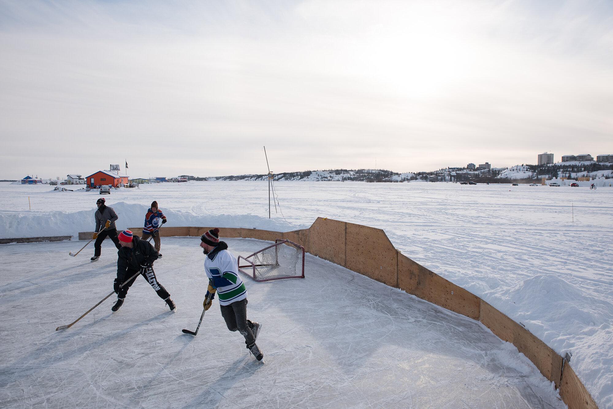 Pandemic Plan - The New York Times - Yellowknife residents play hockey on Yellowknife Bay on...