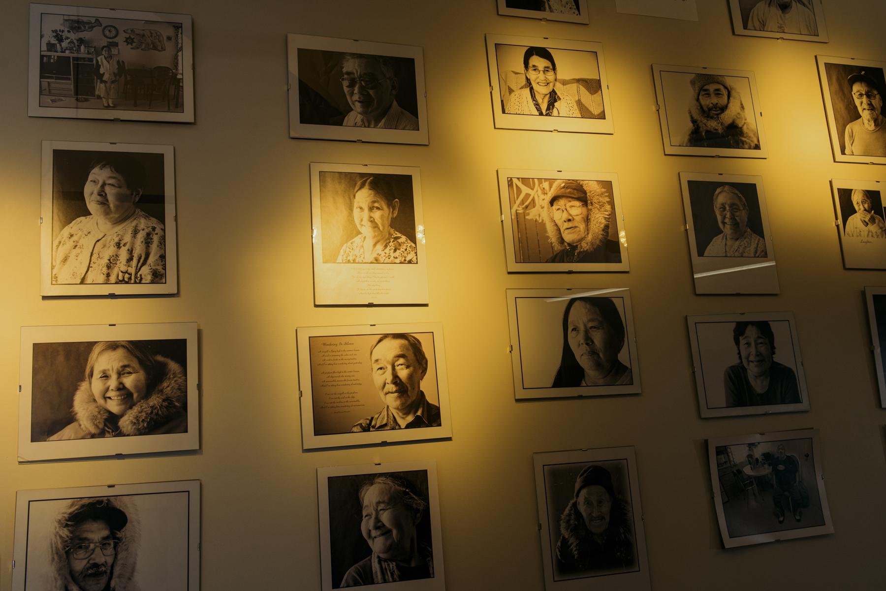 No Place to Grow Old - The Globe and Mail - Portraits hang on the wall inside the Piqqusilirivvik...