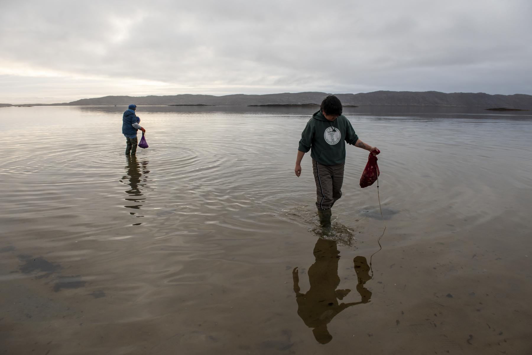 The Hunt for Healthy Food - Iqaluit residents, including a group of elders and youth,...