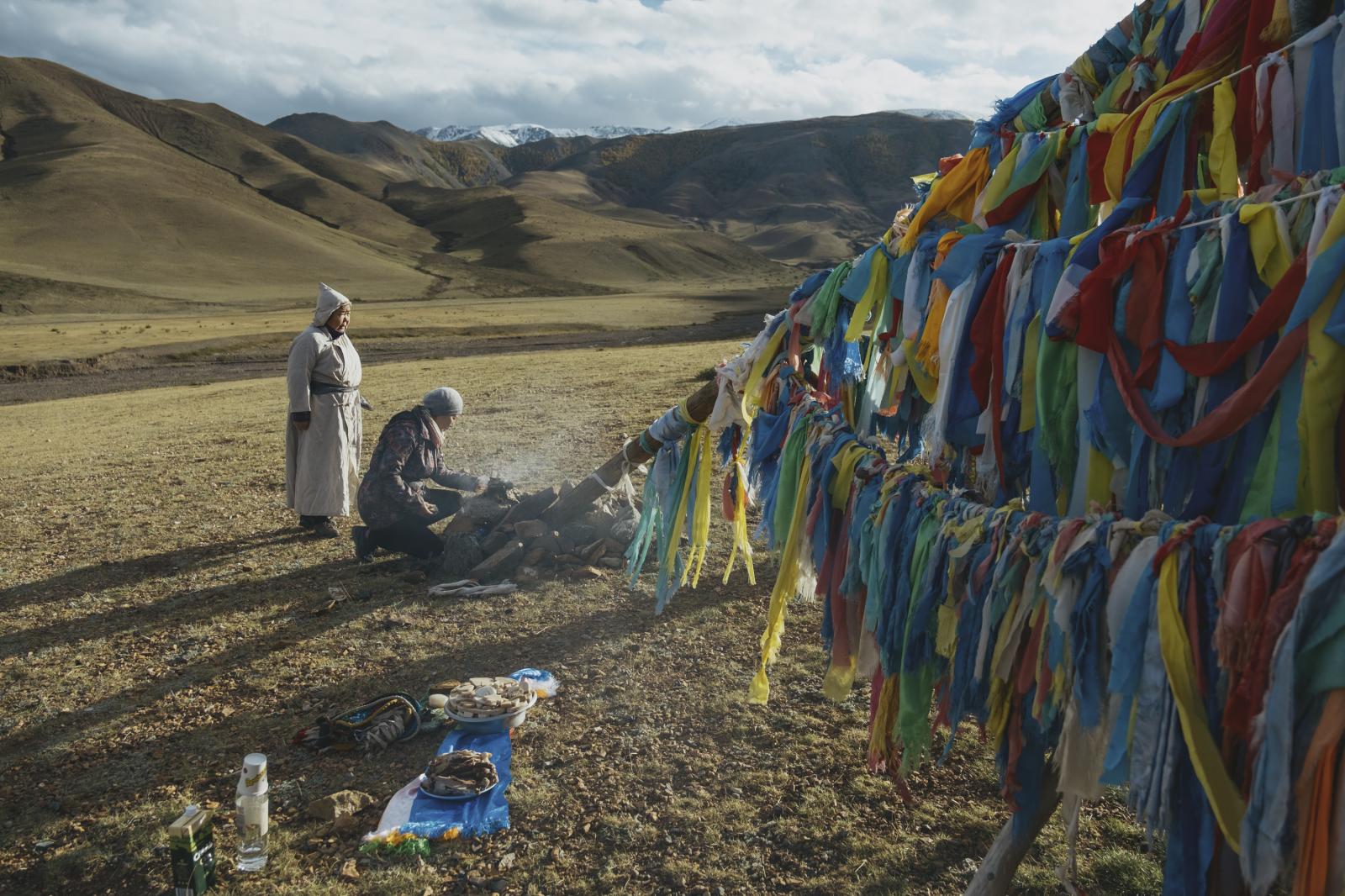 Erjen Khamaganova and Altantset...yer flags near Darvi, Mongolia.