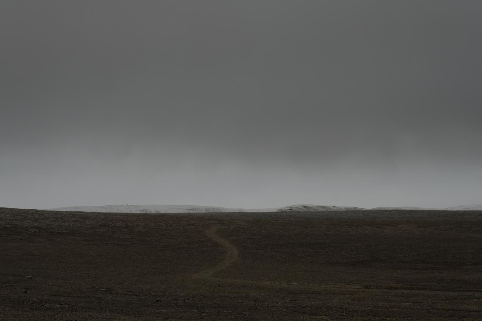 A trail leads out onto the tundra near Resolute Bay, Nunavut.