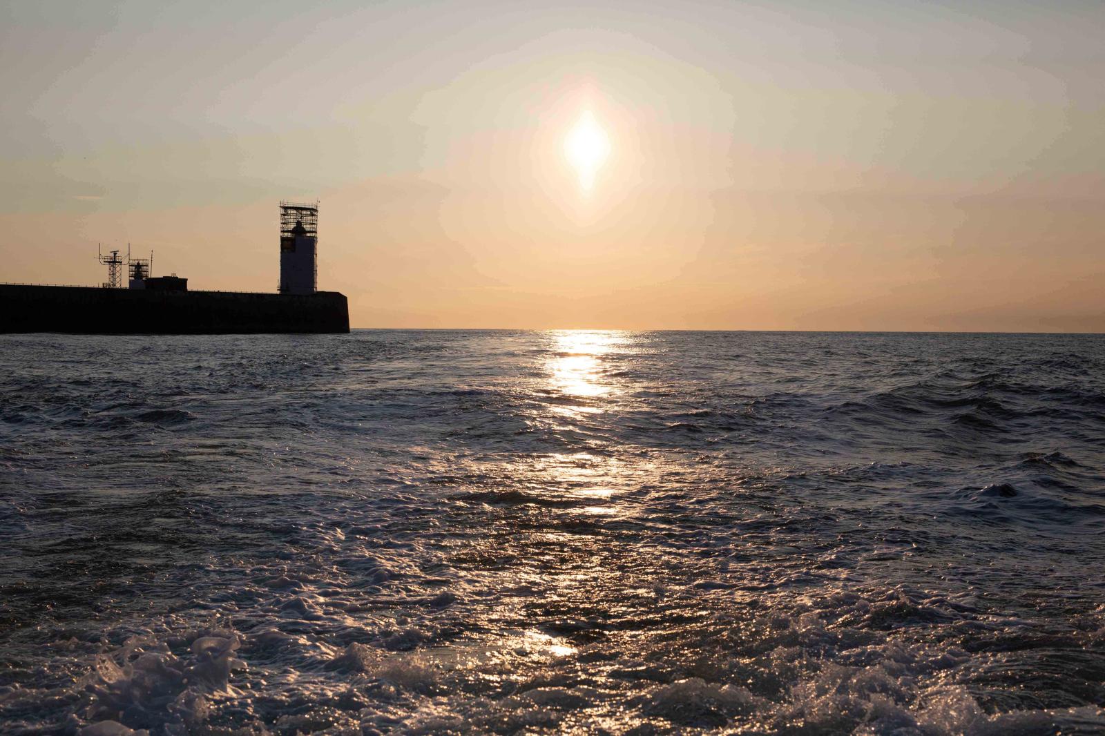 Leaving Dover harbour at sunrise.