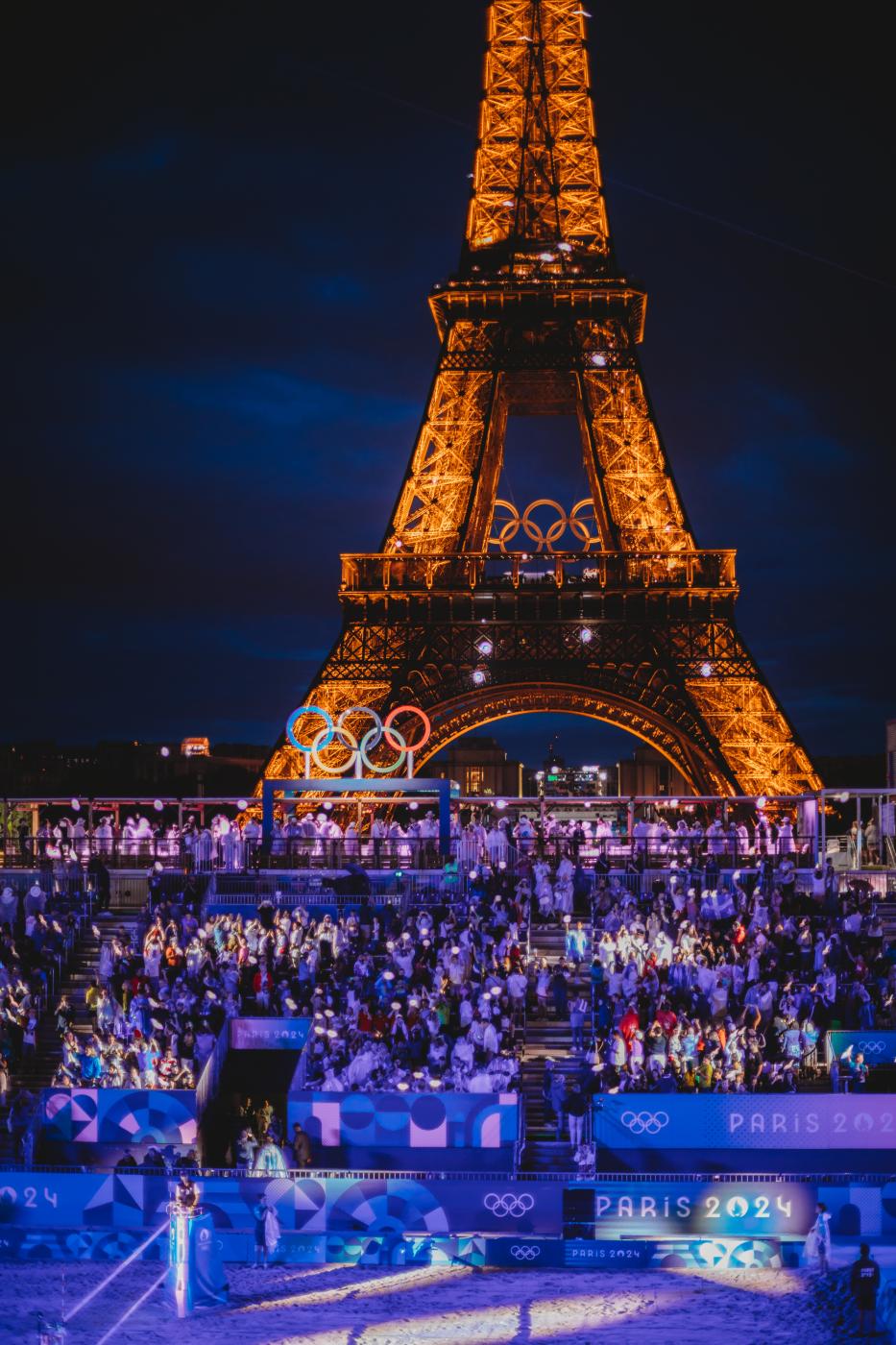 The Eiffel Tower lights up over...n&rsquo;s Beach Volleyball.