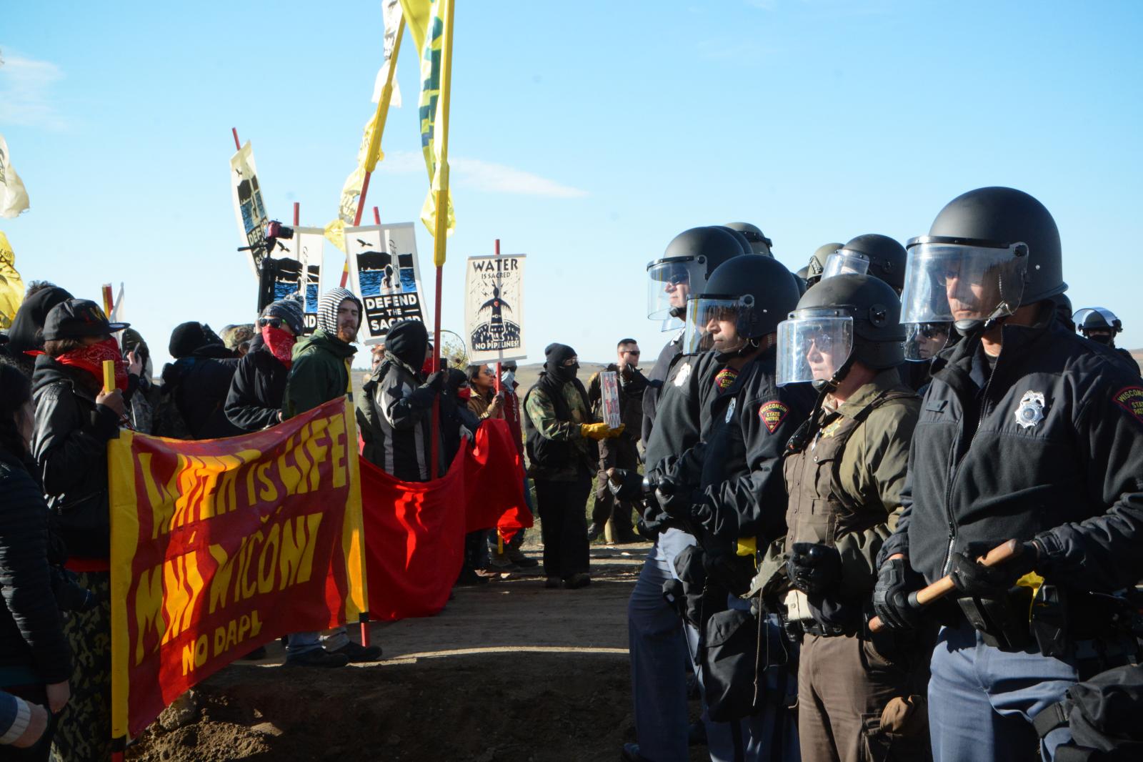 Water Protectors and Police at Pipeline Site, Standing Rock