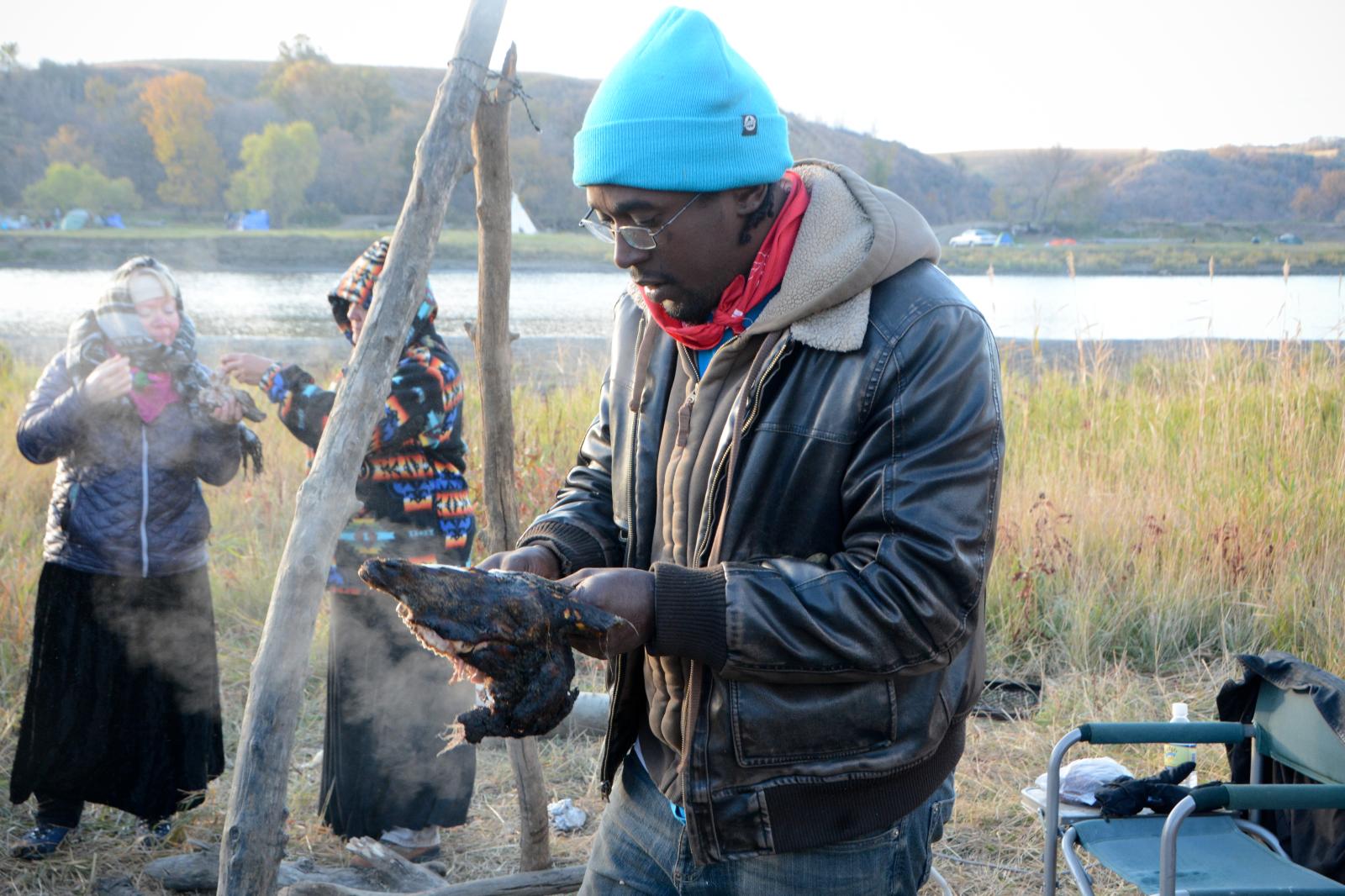 Eating Pit Roasted Goat, Standing Rock