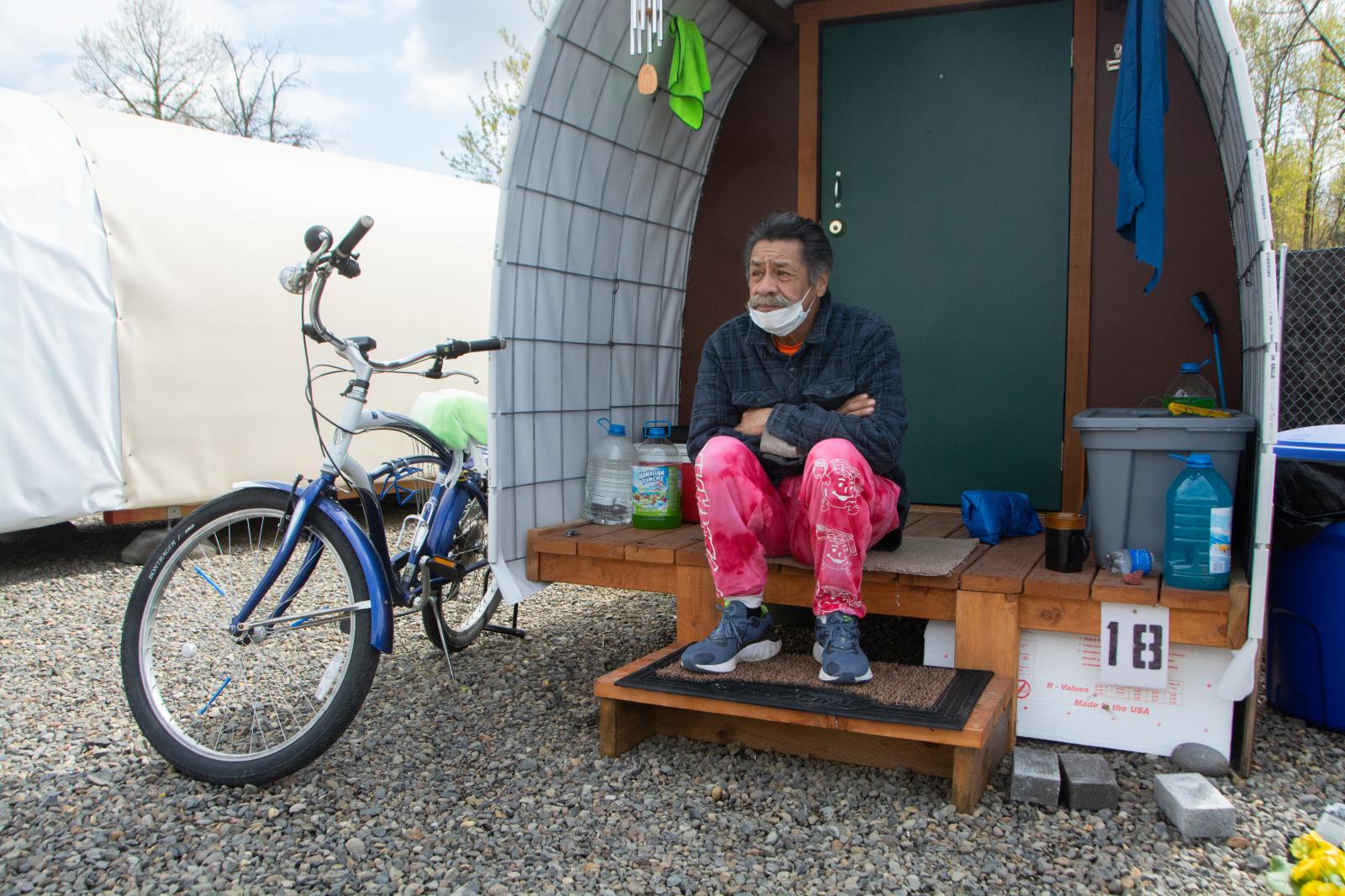 Resident with his Conestoga Hut, March 2021