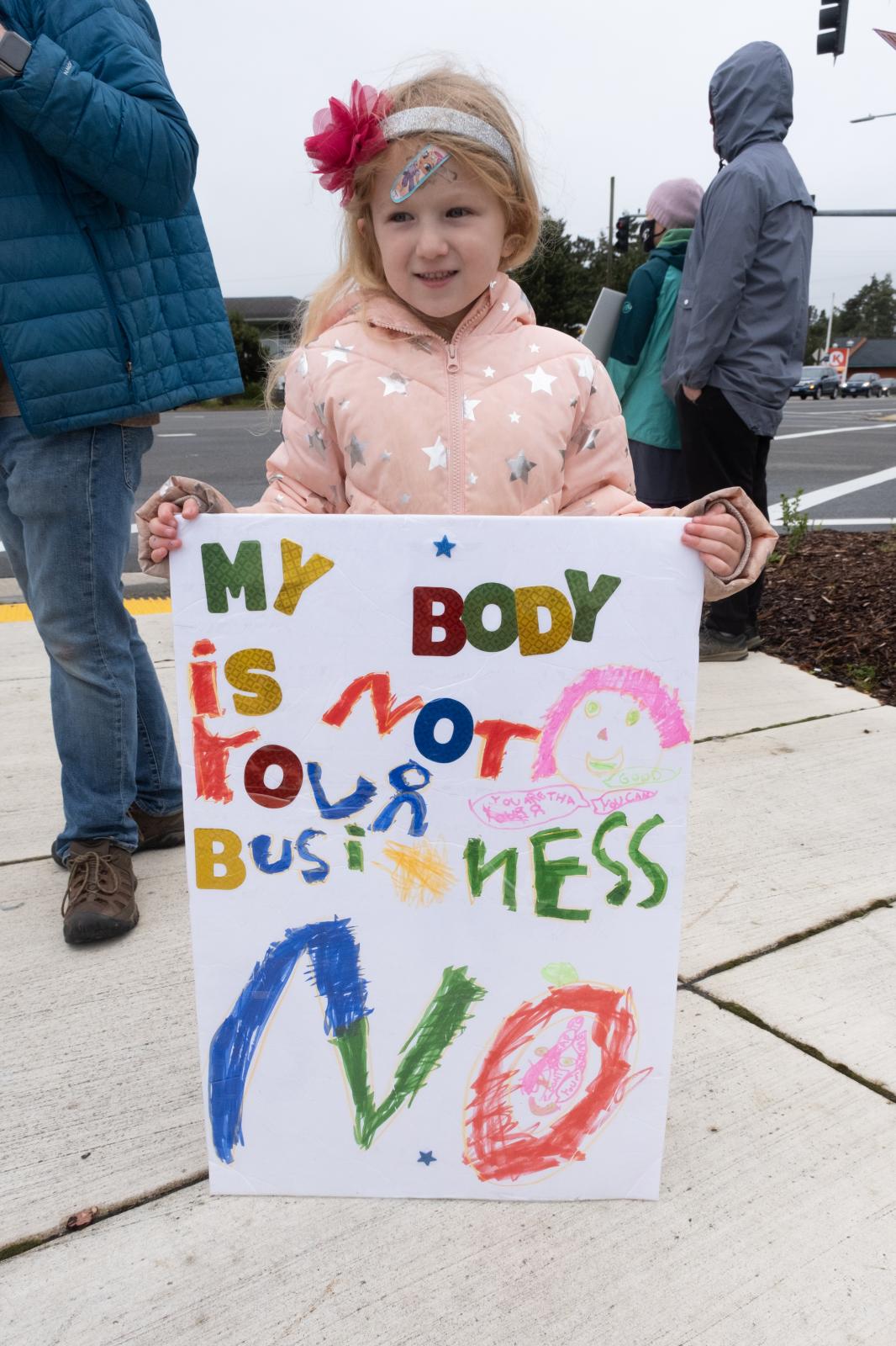 Bans Off Our Bodies Rally Florence Oregon - Young girl with My Body Is Not Your Business sign, Bans Off Our Bodies protest, Florence Oregon,...