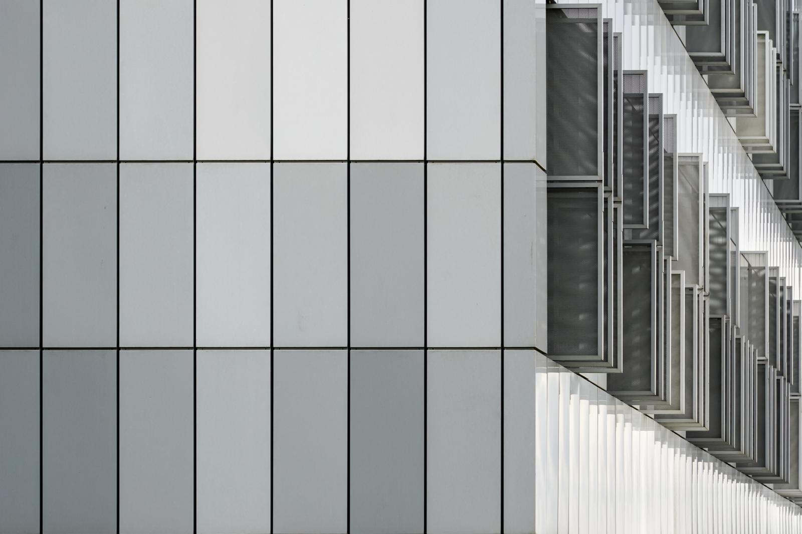 Graz, Austria  # 3895 4/2023 Facade of the MED CAMPUS Graz in eight shades of grey, in the immediate neighborhood of the LKH-Uniklinikum. Design by Riegler Riewe Architects.