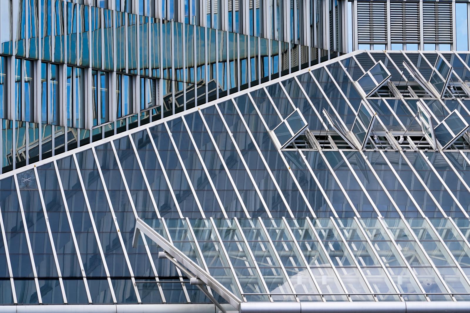 Architectural Symphony in Glass: Interplay of Reflections | Buy this image
