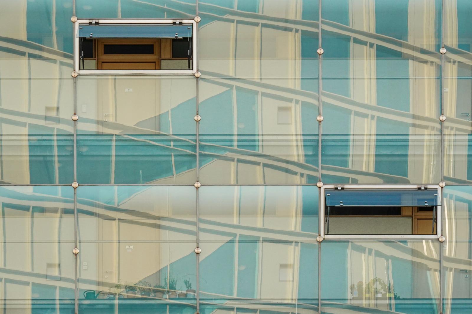 Whispers of Glass and Reflection: Apartments in Innsbruck | Buy this image