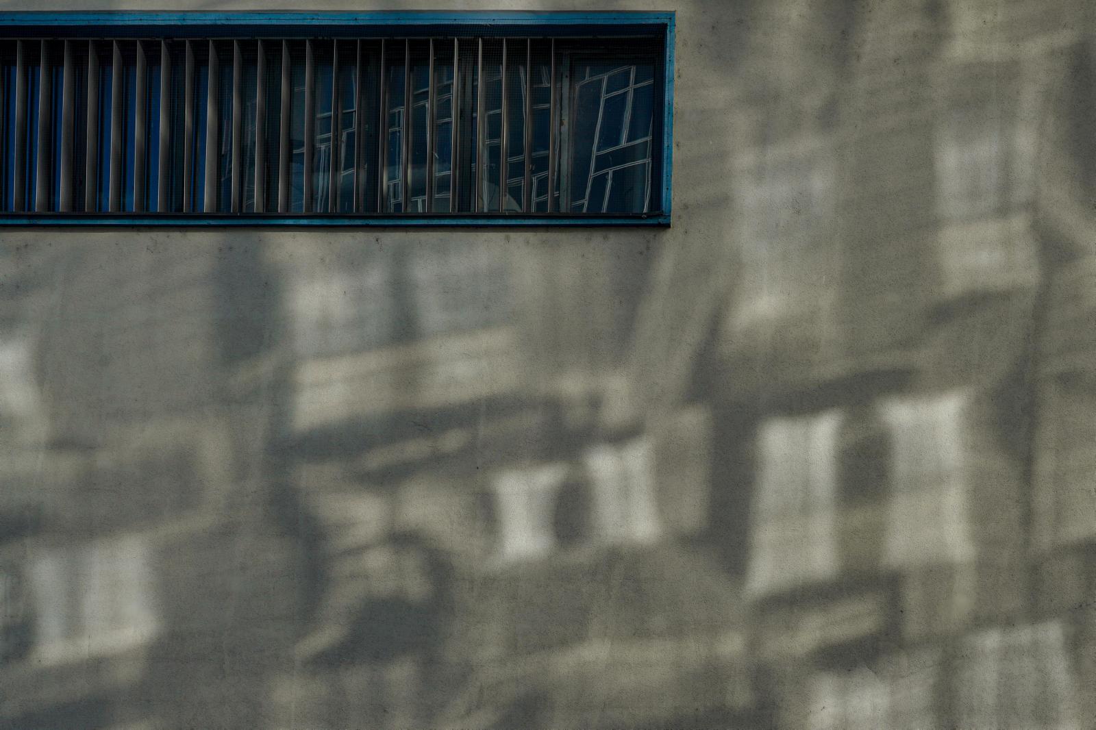 Ephemeral Shadows on Industry’s Canvas in Innsbruck: Poetry of Everyday Life | Buy this image