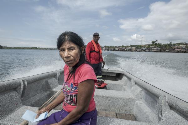 Between conflict and water, the hospital ship of the Pacific Region of Colombia - The lady in the photograph who is traveling in a boat is sick, most likely from Dengue, according...