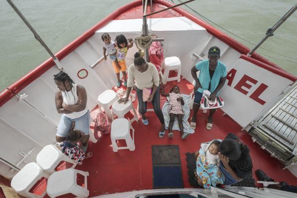 Between conflict and water, the hospital ship of the Pacific Region of Colombia - A group of mothers with their sick children wait on the deck of the San Raffaele hospital ship to...