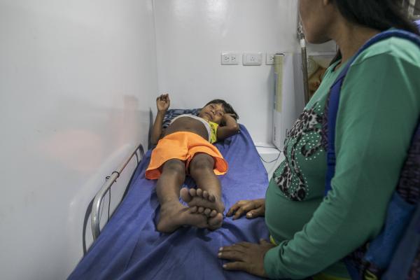 Between conflict and water, the hospital ship of the Pacific Region of Colombia - A girl waits with her mother to undergo minor surgery by doctors from the San Raffaele ship,...