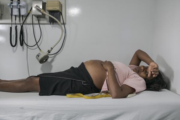 Between conflict and water, the hospital ship of the Pacific Region of Colombia - A pregnant woman from the unworthy community of Puerto Saija is lying down while waiting for...