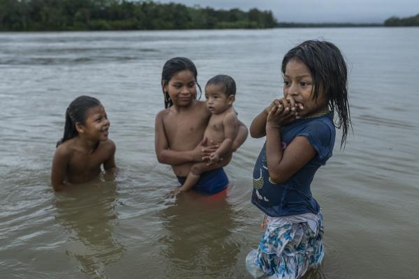 The violated territory, the isolation of the communities in Medio Atrato, Colombia - Some little girls from the community of Bellavista, Choc&oacute; take a bath in the...