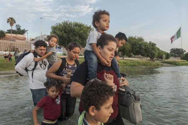 The tortuous journey, the migration through America - A family of Homduran migrants crosses the Rio Grande to try to access the United States of...