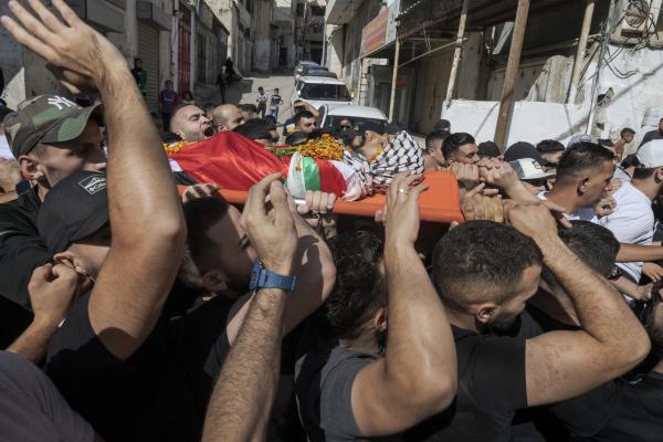 Funeral in West Bank - The lifeless body of 29-year-old Ibrahim Zayad is carried alive to the Qualandya cemetery....