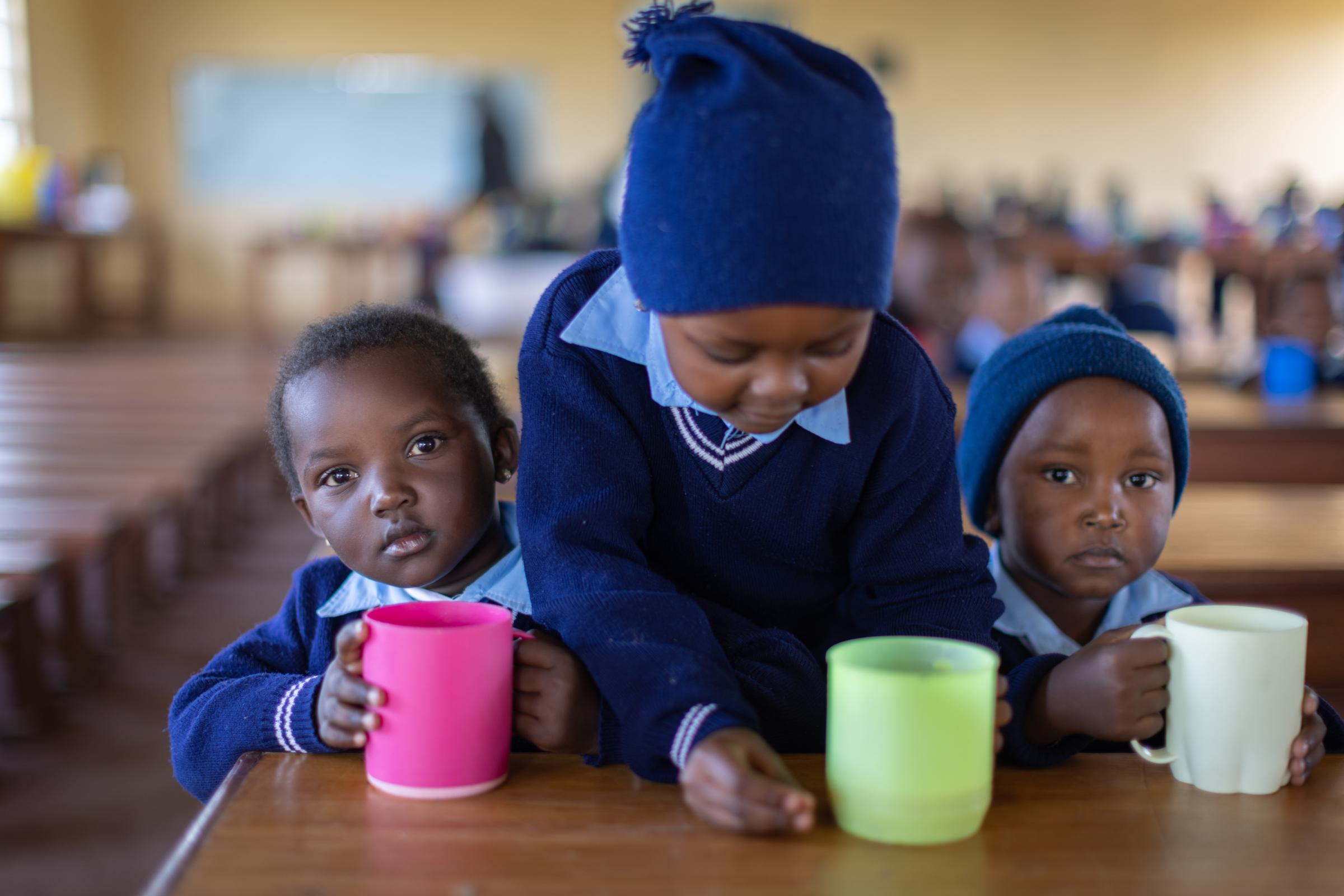 Life on the street in Lusaka - Young children receive a nourishing meal at school twice a day. Without these meals these...